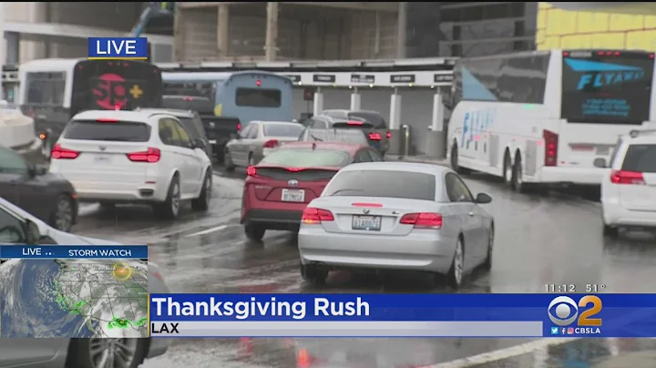 Holiday Rush Continues At LAX Amid Steady Rain