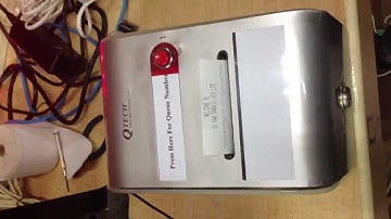 Inserting Paper Roll In Thermal Ticket Dispenser