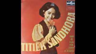 Titiek sandhora-mencari