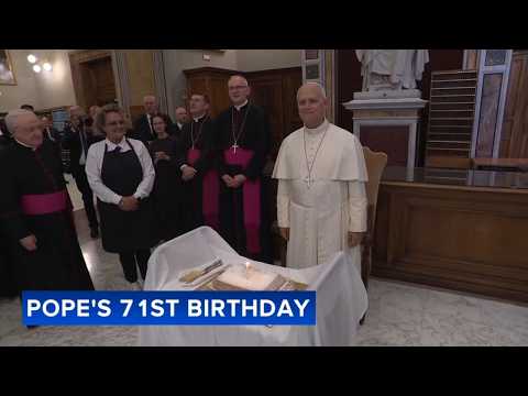 Pope Leo XIV blow out candles for 71st birthday