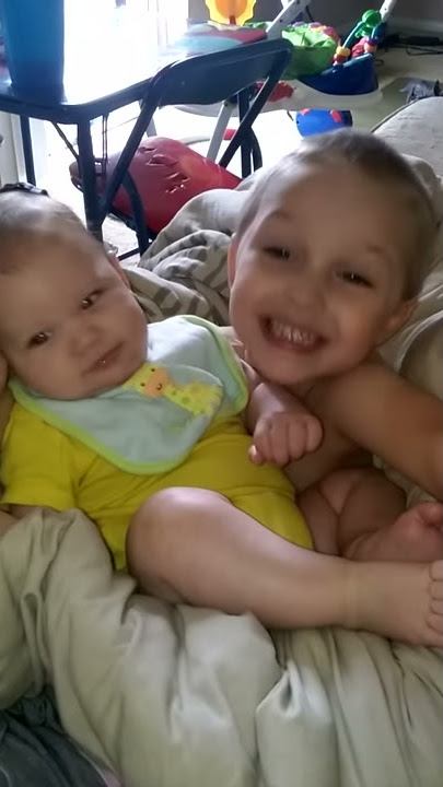 Max holding Nick