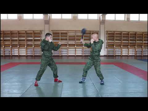 Упражнение 27. Обезоруживание противника при ударе пехотной лопатой сверху или справа (НФП-2009)