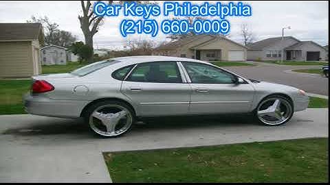 How do you program a 2007 Ford Taurus remote?