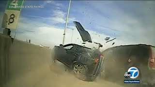 Video: CO state trooper nearly struck by a car that crashed into a vehicle halted by police l ABC7