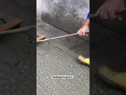 Video: Cos'è la scheggiatura del vialetto di cemento?