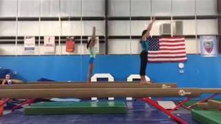 Jessica And Savannah Standing Backs On Beam