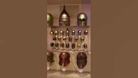 World History-Ancient Greek helmets on display at the Altes Museum in Berlin, Germany.