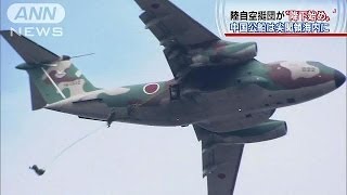 中国意識し