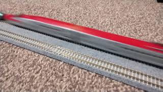 Kato E5 & E6 coupled together full length passing.