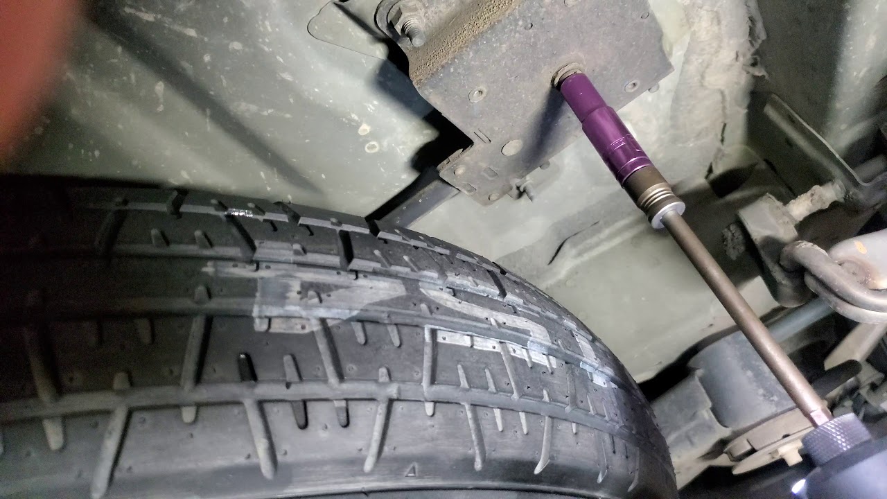 how-to-remove-spare-tire-from-nissan-pathfinder