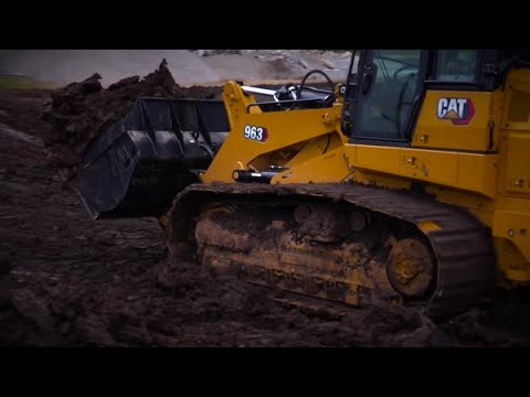 Cat® 963 Track Loader Takes on the Mud