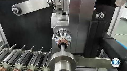 Automatic armature slot insulation paper inserting process