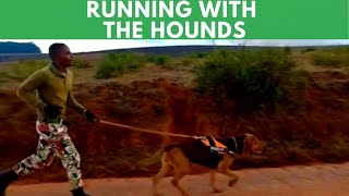 Ranger And Dogs Keep Fit In Nyika