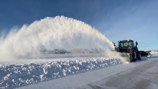 New Holland T4-75 snow blowing at the Poplar Grove Airport