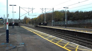 East Coast Class 91 Sky One Livery passing at New Southgate