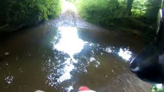 Fording the River Culvery near Crediton in Devon