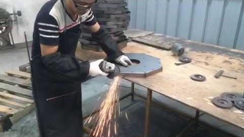 metal base polishing of the rotating tile display stand