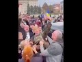 Liberated residents celebrating with ukrainian soldiers in kherson