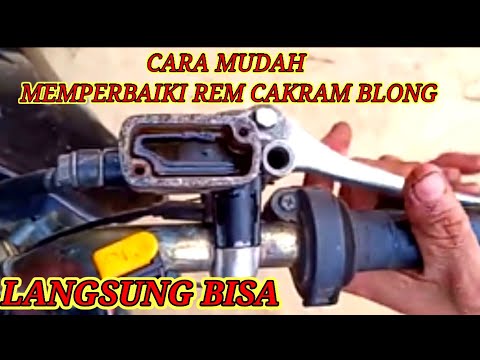 Video: Bagaimana cara memperbaiki rem depan pada sepeda motor?