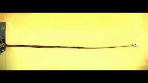 MFC feed forward control of a flexible beam