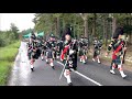 Return march by the Lonach Highlanders and Lonach Pipe Band through Strathdon, Scotland in Aug 2018