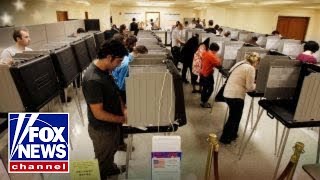 Georgia considers using paper ballots over touch screens