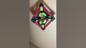 Origami octahedron. Made from 32 rectangles. No glue. Designed by Tomoko Fuse.