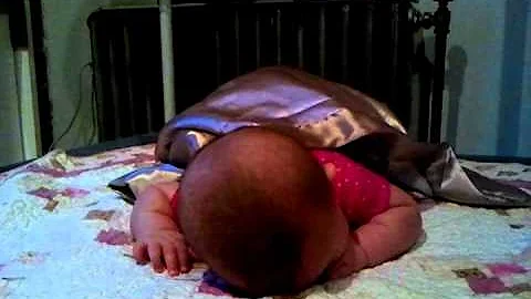 Baby Lois doing her pushups