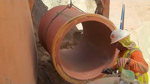 Must Watch Sanitary Sewer Construction Video!  42 in Vitrified Clay Pipe Installation in 4 minutes!