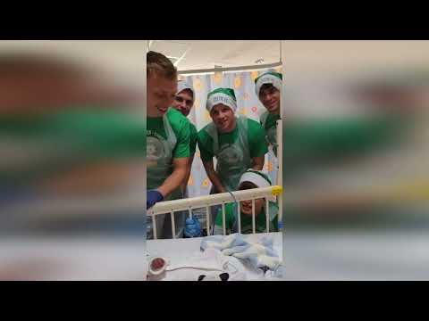 Heartwarming moment Celtic players visit sick kids in Glasgow hospital for rendition of Jingle Bells