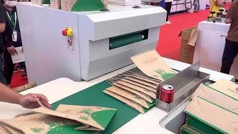 Square bottom paper bag making machine with twisted rope handle