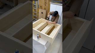 Final trim installation on my DIY bookshelf: Watch the reveal before painting!