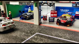 Showcase | Tarmac Works PARTS64 Falken Racing Pit Garage Diorama Showcase | Tarmac Works PARTS64 Falken Racing Pit Garage Diorama