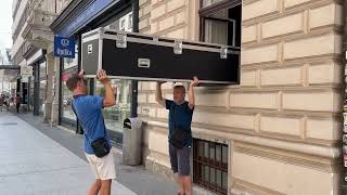 How to enter a room with a sub.contrabass saxophone?
