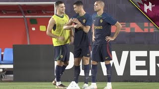 Cristiano flexes his muscles as Dalot admires in Portugal training