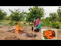 Cooking whole fried chicken in nature far from civilization  rural lifestyle in iran village