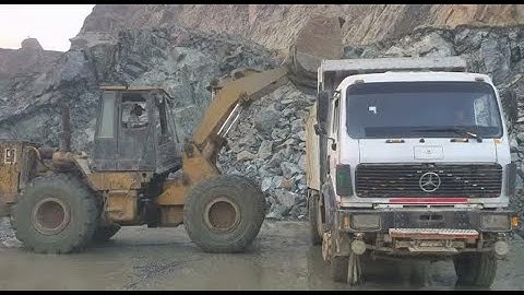 Powerful Wheel loader Loading Heavy Rocks into Mercedes Dump Truck | Extreme Quarry Work!