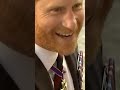 Prince Harry greets fans as he leaves St Paul’s cathedral