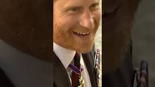 Prince Harry greets fans as he leaves St Paul’s cathedral