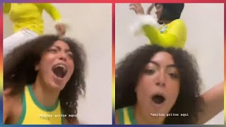 Any Gabrielly comemorando os gols do Brasil