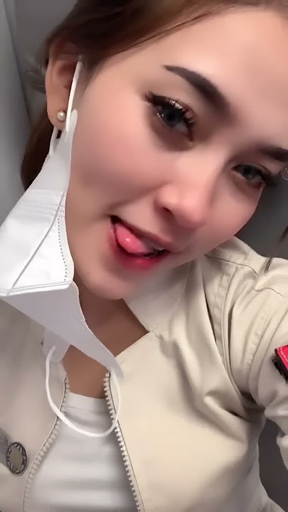 Beautiful flight attendant on duty