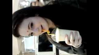 Emma drinking her $5 passionfruit milkshake