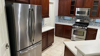 Como quitar las agarraderas a un refrigerador General Electric