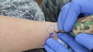 Small heart tattoo lettering M /real time