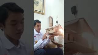 rangkaian listrik dalam bentuk miniatur rumah