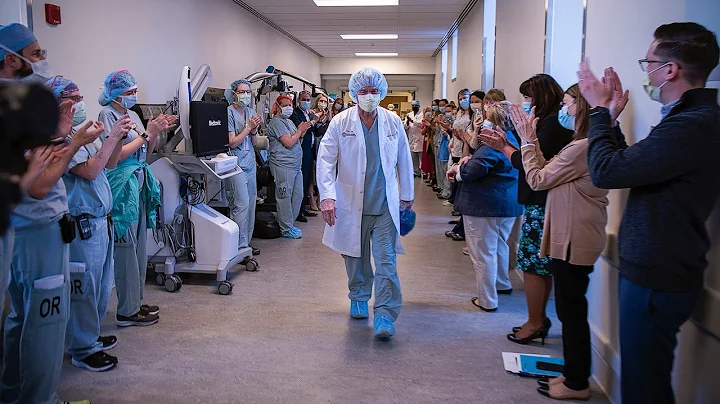 William Farrar performs final cancer surgery at Oh...