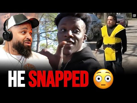 Man in Mortal Kombat Scorpion Outfit Snaps on Rap Video Crew 😳
