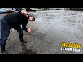 #059-2  Unclogging a storm drain during rain in Germany