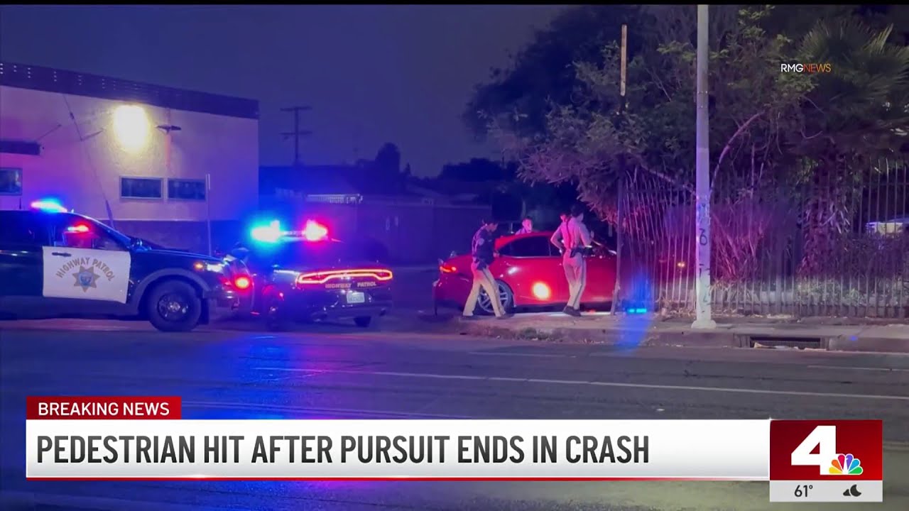 Pedestrian hit by car during police pursuit - YouTube