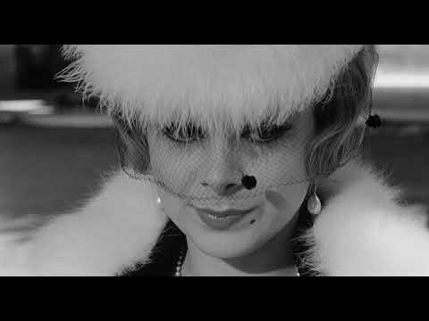 Mastroianni e Sandra Milo sulle note di Nino Rota in 8½ di Fellini (1963)